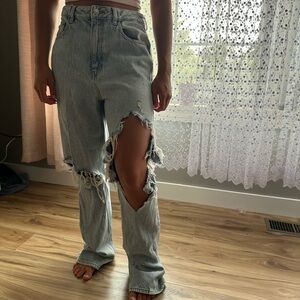 Distressed light jeans for women